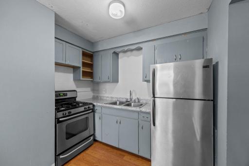 Unit 3 - Kitchen featuring stainless steel appliances, including a gas stove.