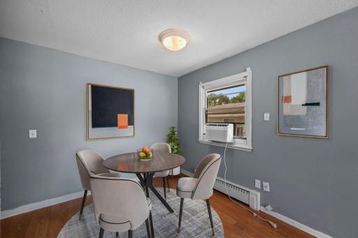Unit 3 - Dining area centrally located between the kitchen and main living space.