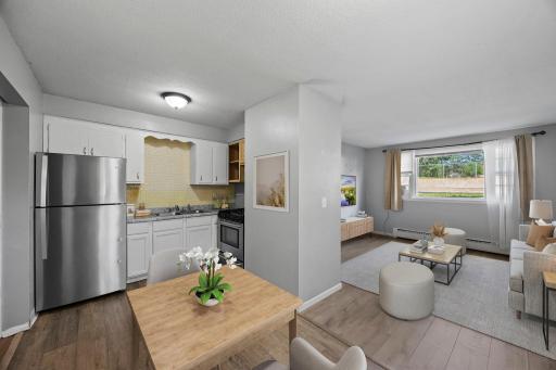 Unit 2 - Dining area conveniently connected to both the kitchen and living room.