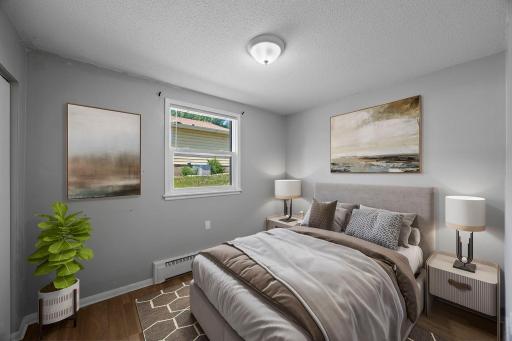 Unit 1 - Bedroom featuring dual closets for plentiful storage.
