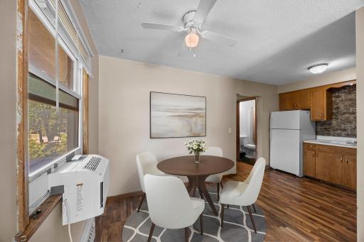Unit 4 - Dining space offering a seamless flow between the kitchen and living room.