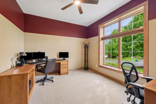 Dedicated main floor office with French doors and large window