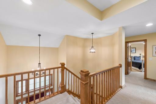 Spacious upper level landing with views to the foyer below, beautiful woodwork, architectural ceiling detail and thoughtful layout with good bedroom separation