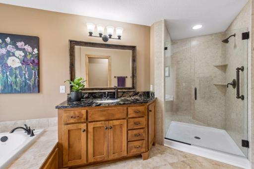 Well designed primary en-suite with separate walk in shower