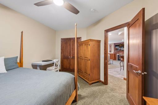 The lower-level bedroom offers privacy and flexibility, making it ideal for guests, family or a home office