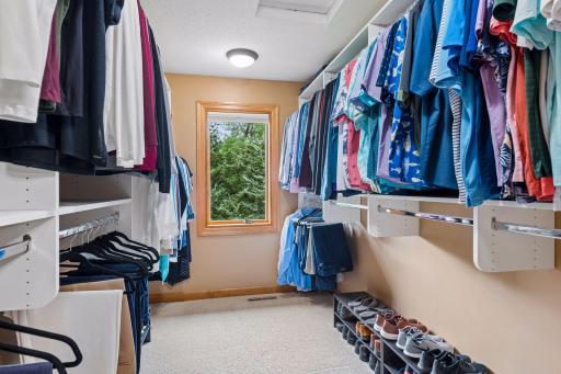 Spacious walk in closet with large window