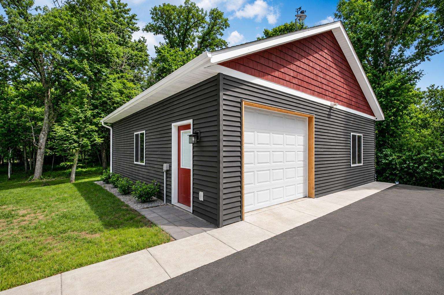 The detached 32' x 32' garage offers approximately 1,000 square feet of heated and cooled space. Recent 2025 improvements to the detached garage include a new boiler for the in-floor heat and a new ductless mini-split system for cooling.