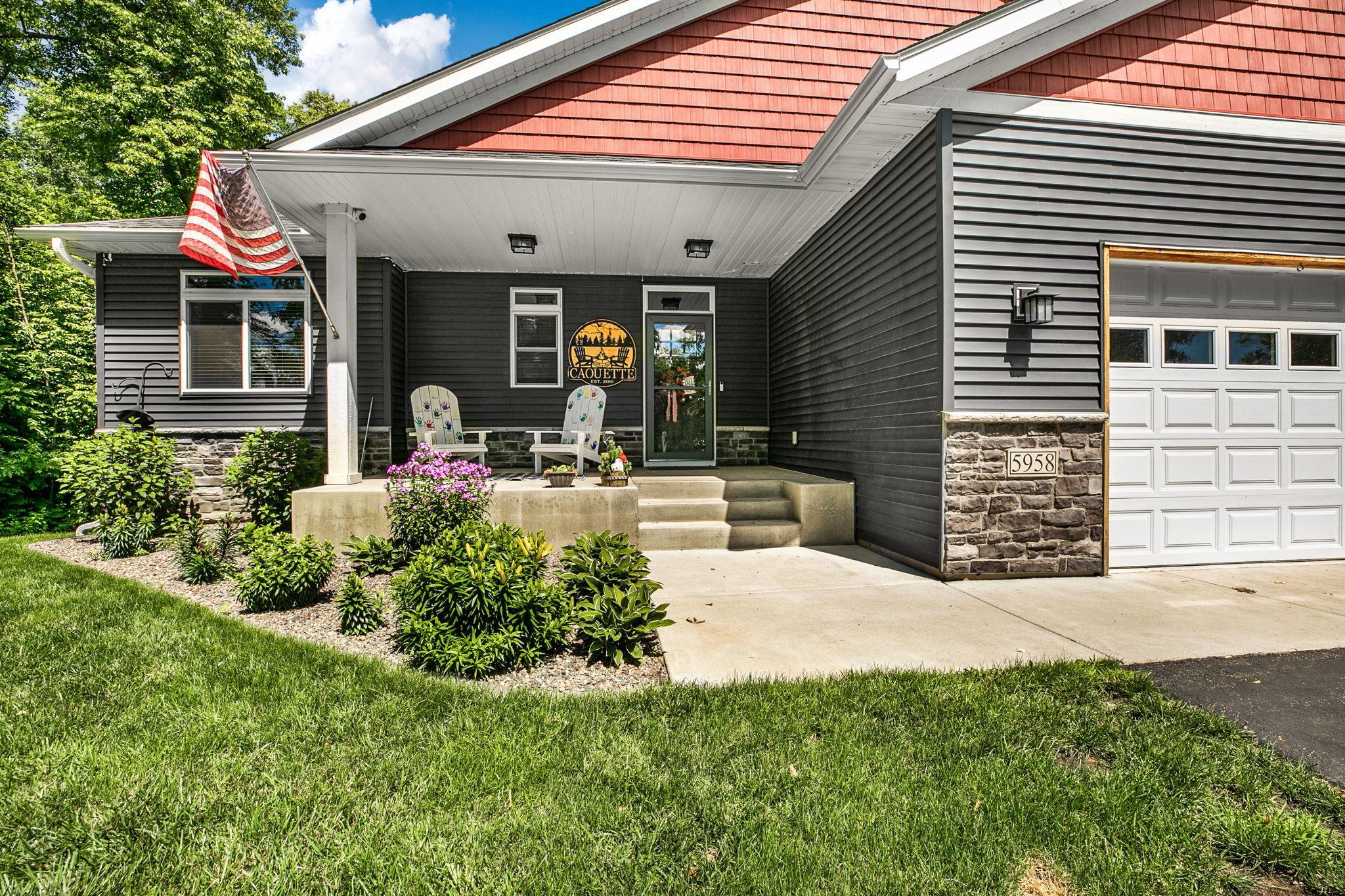 From the moment you arrive, you'll appreciate the inviting covered front porch, thoughtfully landscaped yard, and attractive exterior that make this home feel warm and welcoming.