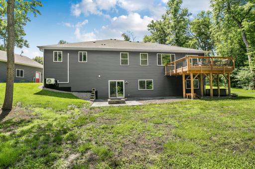 Whether gathering on the deck, enjoying evenings around the fire pit, or spending time in the expansive backyard, this property was designed for making memories with family and friends.