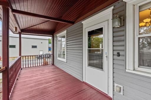 Oversized front porch ready for autumn lounging!