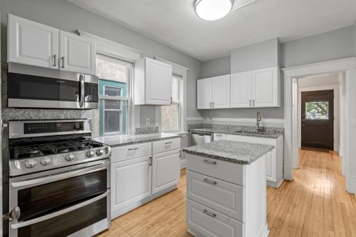 updated kitchen with granite counter tops and stainless appliances