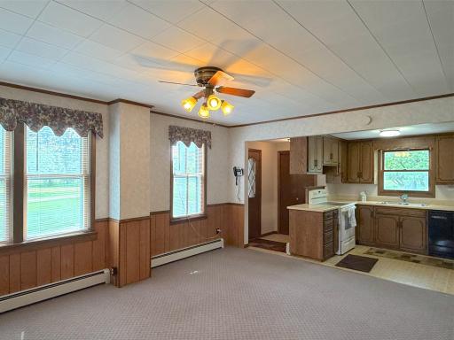 The foyer opens to the kitchen and dining room, the layout creates an easy flow for entertaining and daily living.