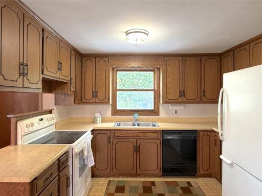 The kitchen offers ample cabinet and counter space, making meal preparation both convenient and efficient.