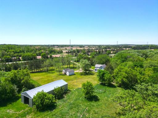 Nestled on 9 gorgeous acres along Plum Creek this property also has direct access to the Beaver Islands Trail.