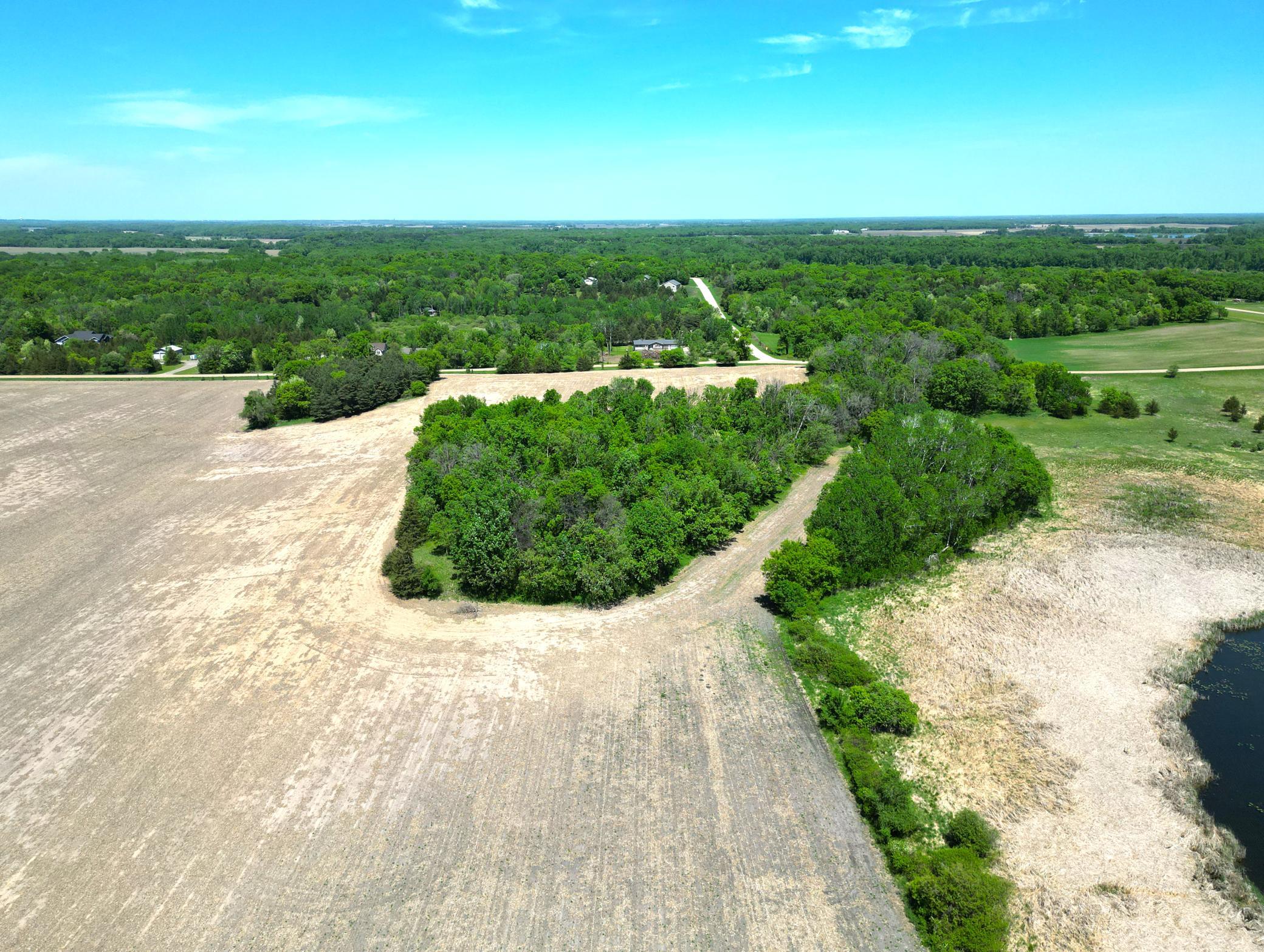Beautiful 10-acre parcel featuring shoreline on a quiet unnamed lake, offering a gorgeous peaceful country setting.