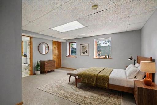 Bedroom 4, virtually staged to show just how livable this lower level really is