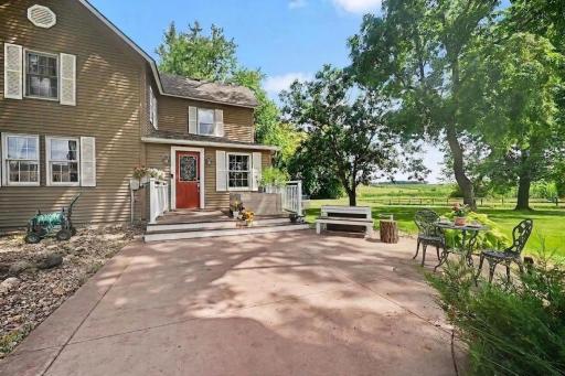 Patio views over 4 acres of fenced pasture: this is the payoff for buying acreage