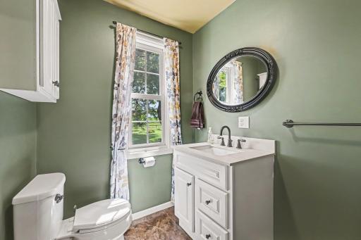 A convenient main level half bath for guests, no stairs required