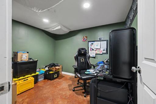 A bonus room on the lower level, flexible enough for a home gym, playroom, or hobby space