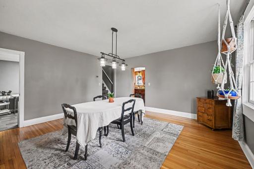 Original hardwood floors underfoot, a century of character built right in