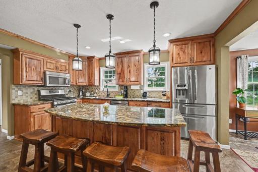 Island seating for the crowd that always ends up in the kitchen anyway