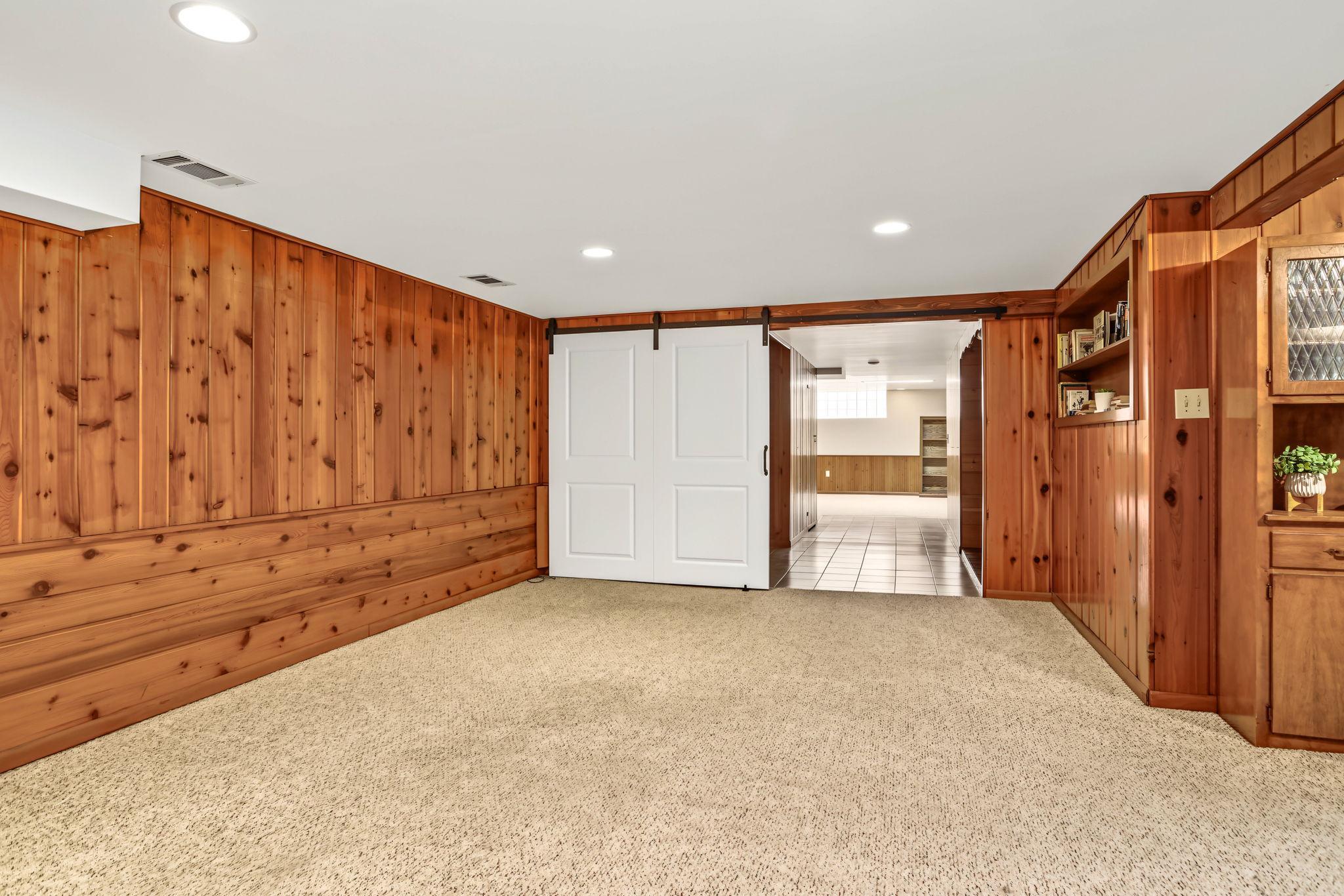 On the other side of the hallway is an incredible fourth bedroom.