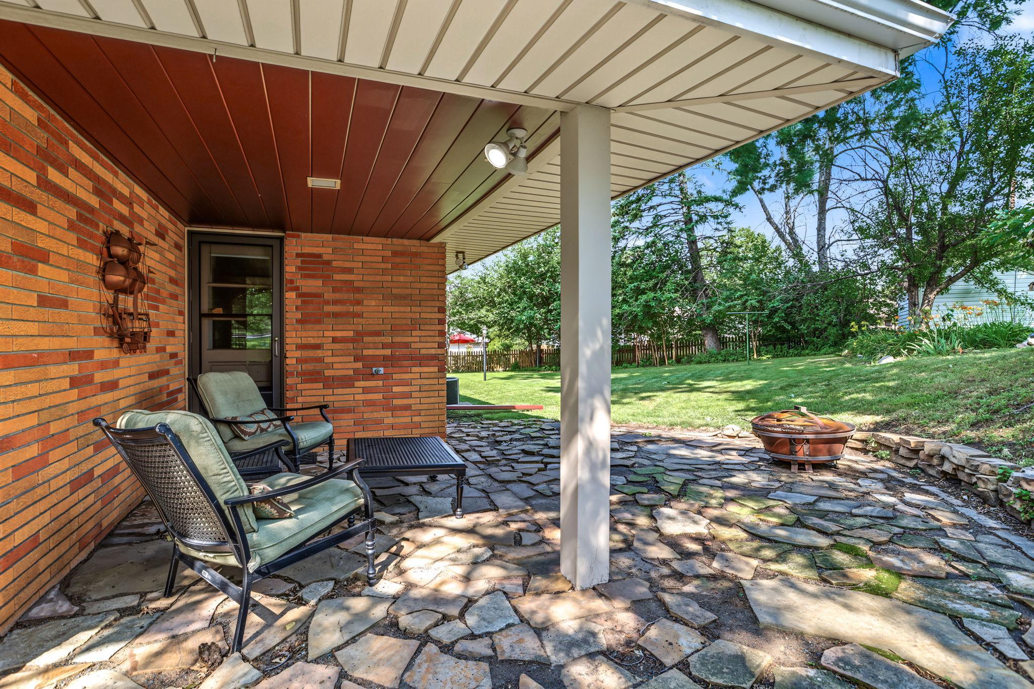 Lovely area to sit outside, with a gas line already in place for a grill.