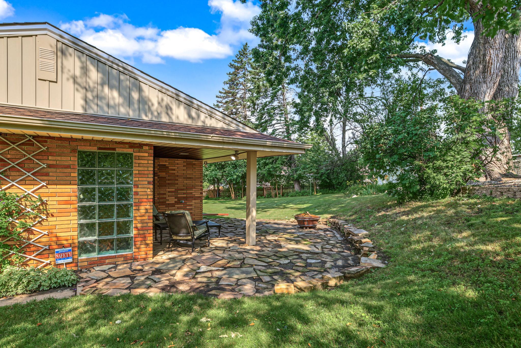The garage wall also features glass block windows.