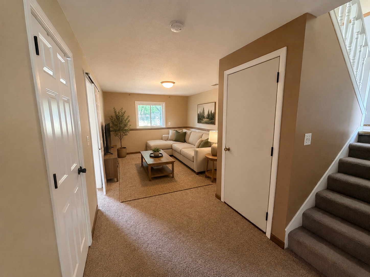 Virtually Staged lower living room.PNG