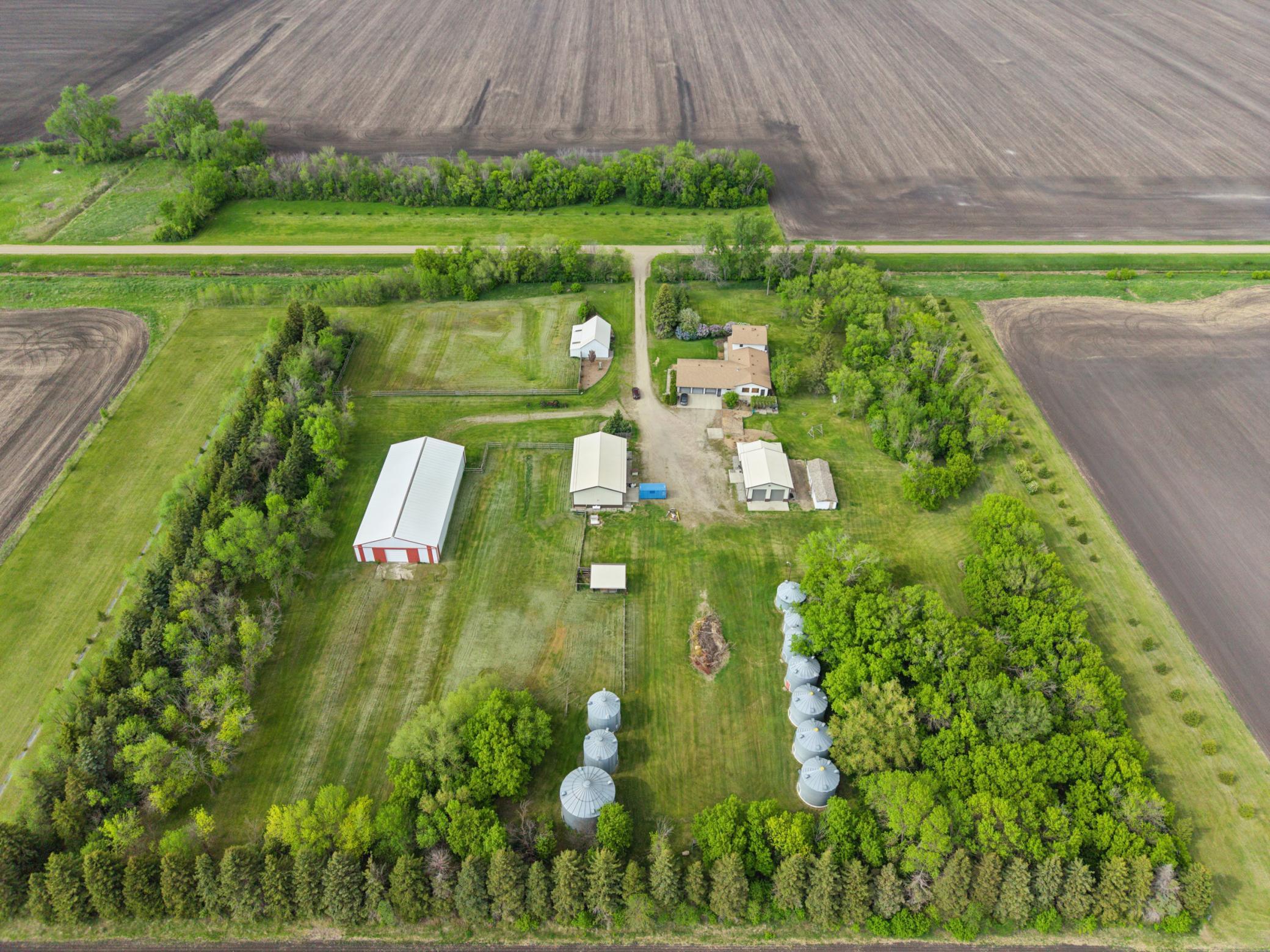 12 acre farmyard + 3 Acres across road