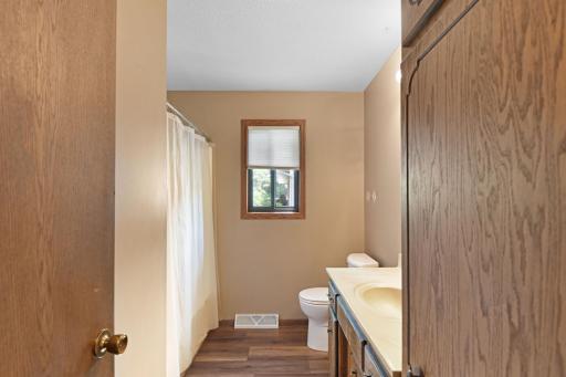 Big linen in the main floor bathroom provides plenty of storage space
