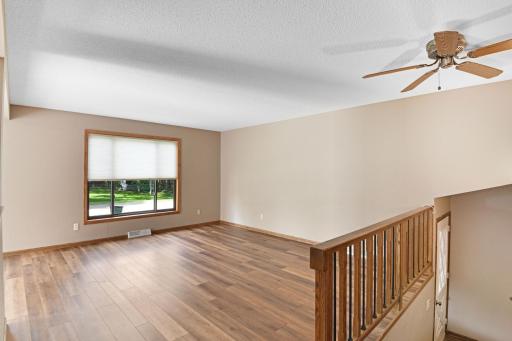 Spacious livingroom open the dining offering tons of natural light