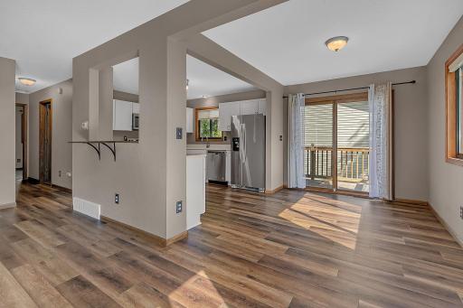 Updated flooring designed for everyday wear and tear ~ and brand new kitchen cabinets!
