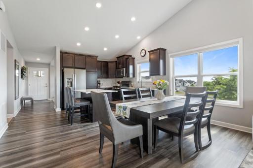 Dining area off kitchen and open to the living room