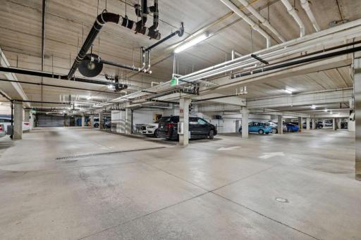 Heated Underground Parking. There is a car washing stall that all residents may use. You can access the golf simulator room from garage.