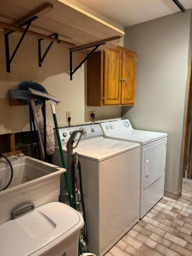 Washer, Dryer & LDY Tub! Folding DR to hide.