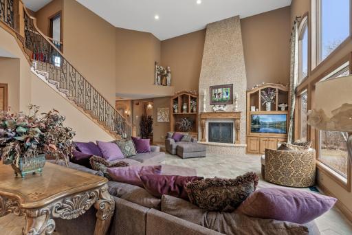 Grand staircase with dramatic 'statement' fireplace