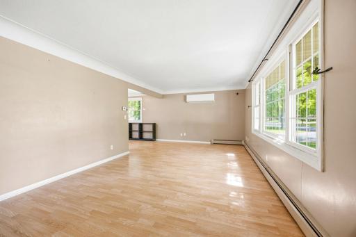 Spacious living room with plenty of light.