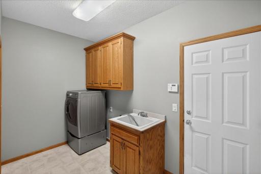 mudroom/laundry room located conveniently off of the garage