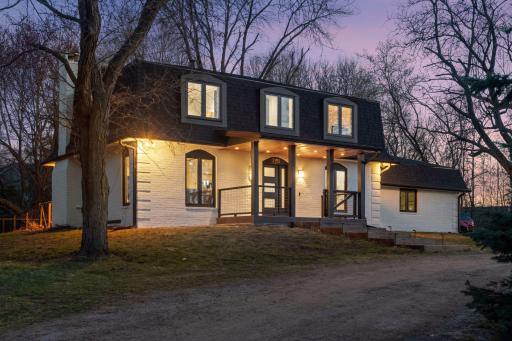 Inviting updated Minnetonka Beach property offers a rare blend of charm, character, and privacy.