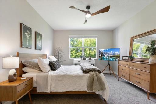Primary with beautiful views of backyard