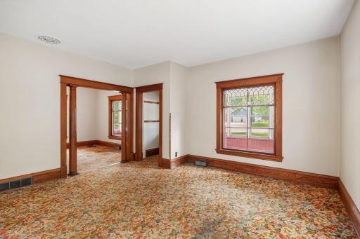 Gorgeous original trim work and some leaded windows.