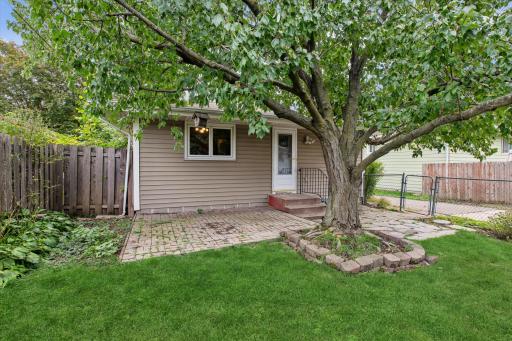 Back view of home and patio perfect for bbq's and entertaining