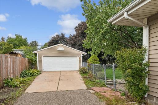 2 car garage, long driveway, fenced in backyard with concrete apron