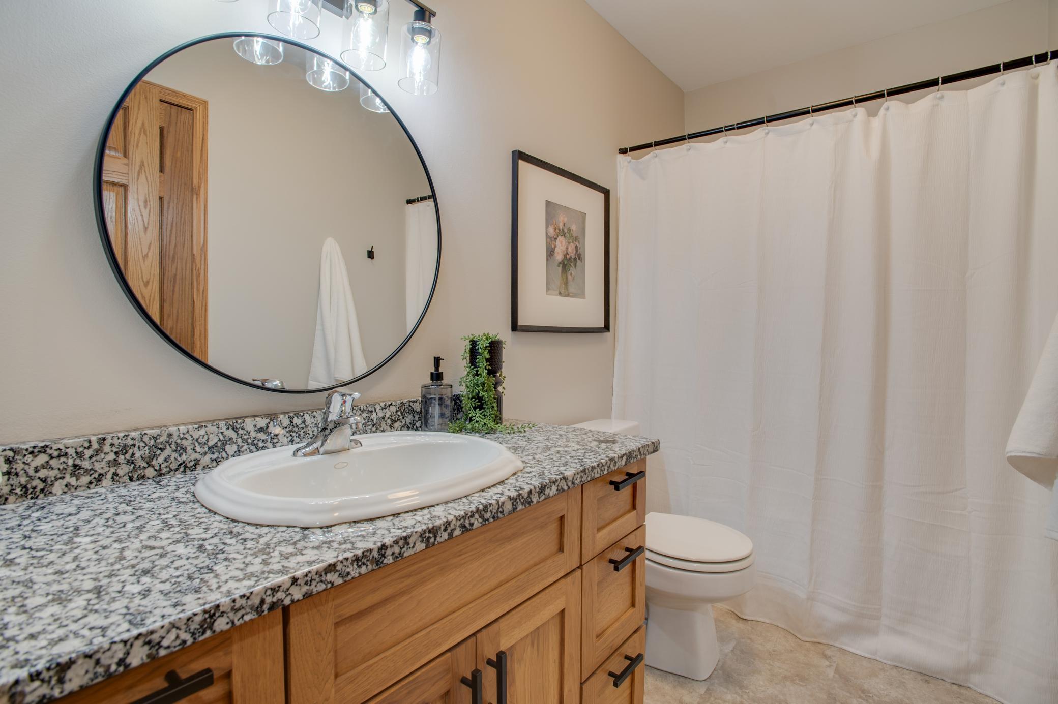 bathroom 2 with granite countertops