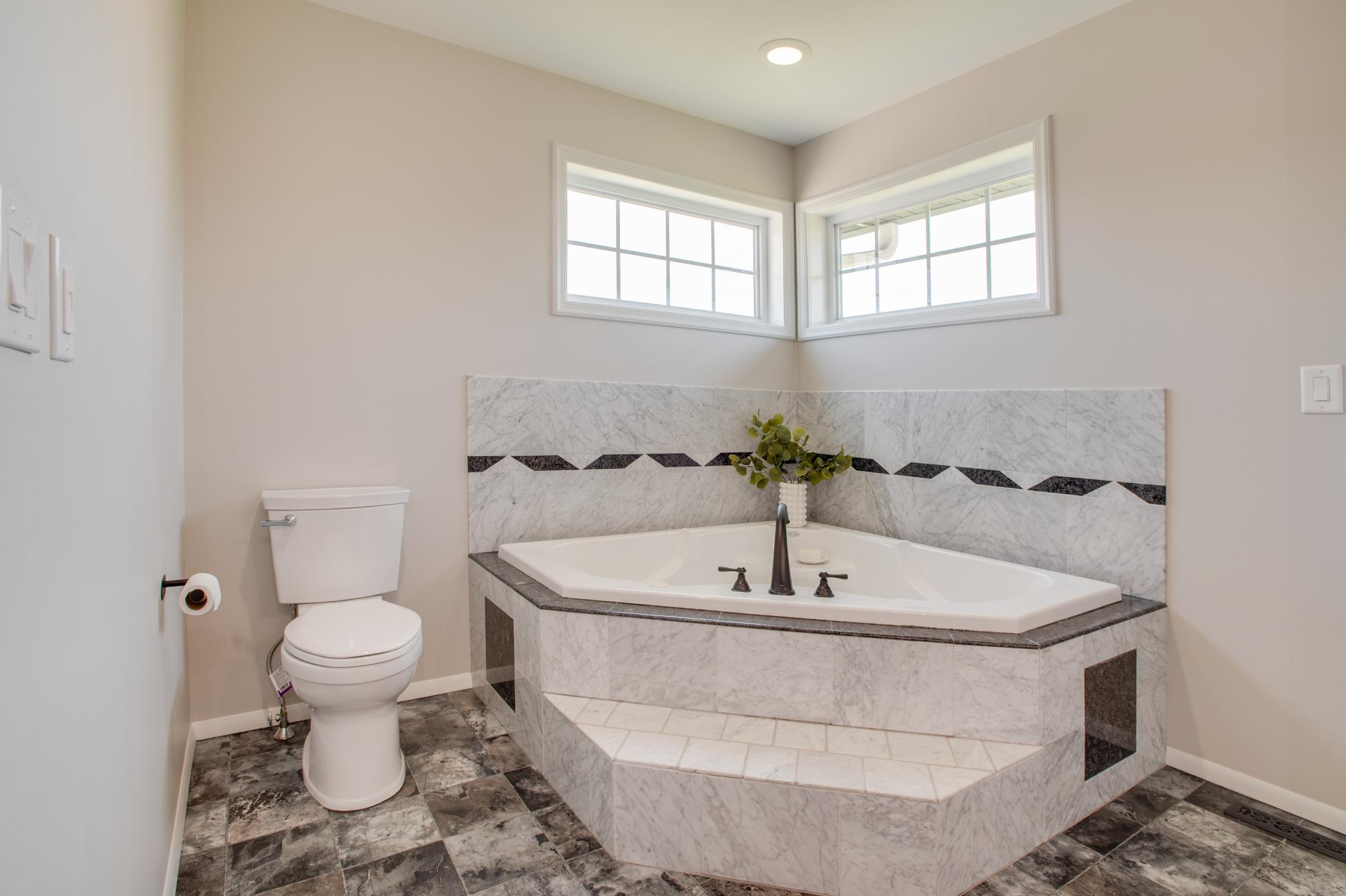 giant soaking jetted tub in primary