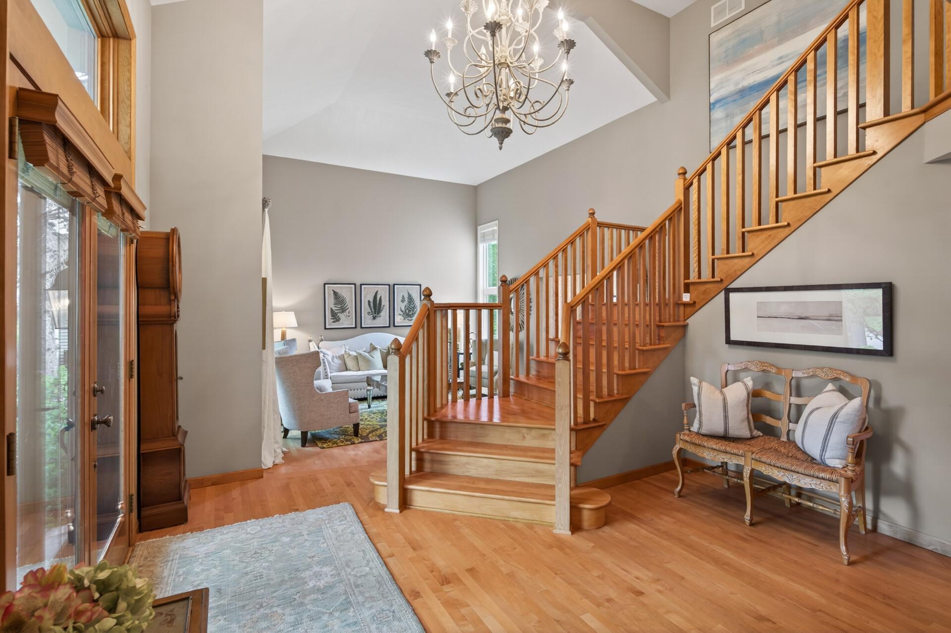 This grand entrance sets the stage for this beautifully built Lundgren home.