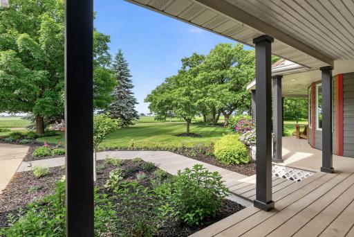 Start your mornings with coffee and end your evenings watching the sunset from this inviting front porch.