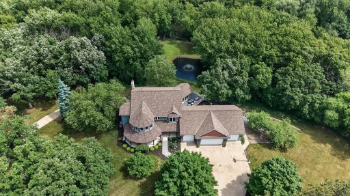 A rare opportunity to own an incredible slice of Minnesota—complete with private acreage, a scenic pond, and beautiful river frontage that create a truly one-of-a-kind setting.