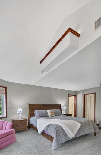 A beautifully sized bedroom that feels both welcoming and expansive.
